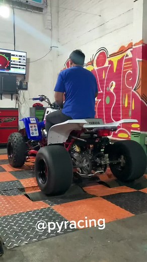 Working on a Yamaha ATV in a Garage Setting