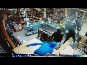 Seven Suspects Smash and Grab Gun Store | Surveillance Video