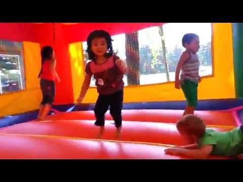 Kids Play in Inflatable Bounce House!