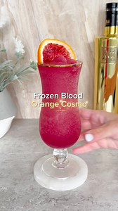 Frozen Blood Orange Cosmo 2 oz Vodka 1.5 oz Orange Liqueur 1 oz Lime Juice Either: 5-6 fresh pieces of blood oranges 1/2 cup frozen blood oranges 3/4 oz Blood Orange Syrup #frozendrinks #bloodorange #cosmo #cosmopolitan | Styled By Daisies