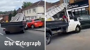 Watch: Swerving truck mounts pavement and hits multiple cars as suspected drink-driver arrested