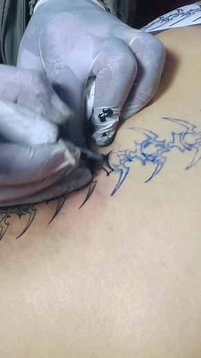 Biomechanical Spine Tattoo Design Inspiration