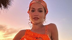 Rita Ora sports barely-there dresses as she celebrates banking almost £30m