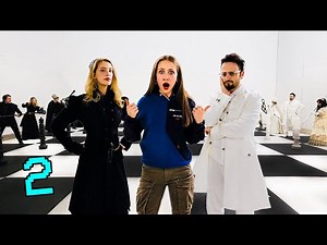 Human Chess with Masters Who Can't Control Their Pieces