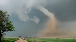 This is my dashcam video of an entire life cycle of a tornado from start to finish. I shot this in 2019 near McCook, Nebraska. You will see the tornado form out of the clouds, touch down, mature and then rope out. The entire sequence takes 6 minutes total. the voices you hear are myself, first time storm chaser and driver Damon and tour guests Erin and Jade. On the radio in the second truck you can hear my friend Alan Gofenko. | Greg Johnson, TornadoHunter.ca