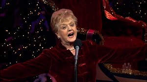 Dame Angela Lansbury won the Tony Award for Best Leading Actress in a Musical for originating the titular character in Mame. Watch her perform "We Need a Little Christmas" with the Mormon Tabernacle Choir in 2001. | Musical Theatre Moments