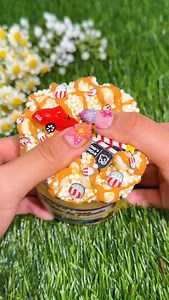 170 reactions · 6 comments | I used to go to drive-ins every summer, so this slime brings back all the memories  The popcorn scent is so spot on! I can’t stop opening the container just to smell it  Drive-in Movie Popcorn texture: floam DIY scent: buttered popcorn + caramel drizzle  #movievibes #slimeasmr #snoopslimes | Snoopslimes | Facebook