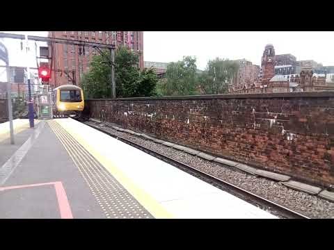 Class 323 electrics arrive Manchester Piccadilly platform 13