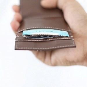 1.4K views | The wallet opens upwards so there’s no real possibility of the coins slipping out but if in the event it does, we’ve got you covered.  on! Buy this product here - You can buy this product here - https://www.thepostbox.in/collections/wallets/products/condense-dark-tan | The Postbox | Facebook