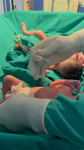 Newborn baby receives vitamin K injection after birth and is then handed over to the grandmother at the table #cute #newlife #babyhealth #newborncare #fblifestyle #babyvaccination #vit k # atbirth #laberroom | Little Angel Care