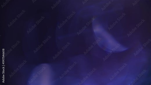 light leak and bokeh overlay with soft blue and purple hues creating a dreamy, ethereal effect. This can be used as a transition or a stylistic element in video editing.