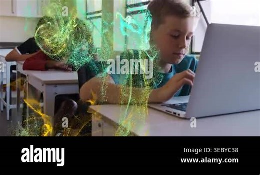Front student typing laptop while particles appearing left drifting across desks showing lesson. Classroom, children, learning, focus, computer, overlay, edtech Stock Video Footage - Alamy