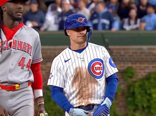Elly De La Cruz tapped Matt Shaw on the helmet after he was called out at second and motioned him to go back to the dugout. De La Cruz later made an error that caused the Reds to lose. (📸: Marquee Sports Network)