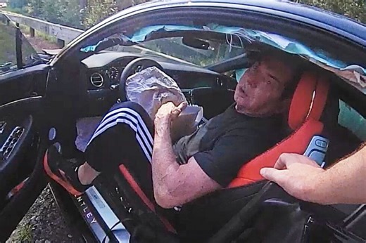 Police video shows former WWE CEO Vince McMahon crashing his Bentley at over 100 mph