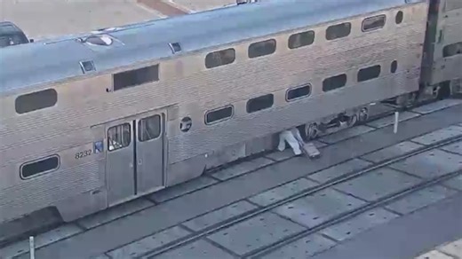 Video shows person crawling under Metra train before it leaves station