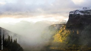 Fog Swirling Around Heavy Runner Mountain From The Going to the Sun Road, Glacier National Park, Montana, USA