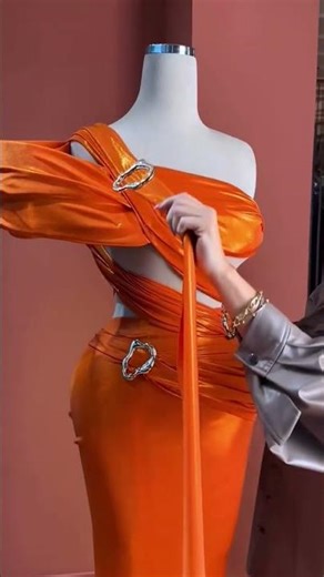To order this orange dress DM reineecouture A sleek satin mermaid skirt crafted to sculpt and