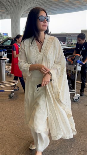 #KatrinaKaif looks flawless in a classic salwar kameez as she jets off from the city after attending #AnantAmbani & #RadhikaMerchant’s wedding. 🤍💫 | Bollywood Now