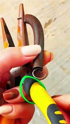 "Modified pliers with spring, creative repair enhances tool function."