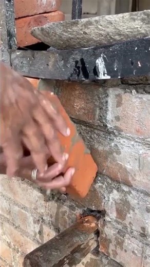 the process of installing bricks on the window wall #construction #brick #popular #shorts