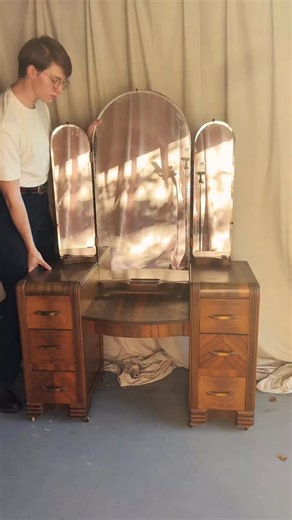 Kyle William on Instagram: "I found this 1930s Art Deco vanity in rough shape. After hours of scraping, sanding, staining, and shellac, I finally brought it back to life. . I always love when I get to restore a piece for my own space. ✨ Should I keep doing more restorations like this? . Comment RESTORE for a list of all products used! . There were a lot of spider webs hiding in this piece, so technically this counts as a Halloween post. 🕷️ . Comment RESTORE if you want me to send the product li