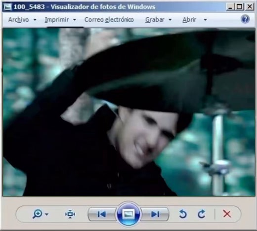 objectively honest but spiritually a bit larp who the FUCK is playing videos on the windows 7 image viewer with the windows me layout