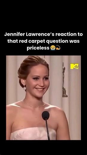 Celebrity Media on Instagram: "At the Oscars red carpet, Jennifer Lawrence delivered one of her most iconic and viral moments when she was asked a familiar, surface-level question about her “process for getting ready.” Instead of giving a standard beauty routine answer, the Oscar-winning actress used her trademark humor to flip the script, casually listing the basics — waking up, showering, getting dressed, doing makeup — before jokingly adding that she took a shot before the show. The candid re