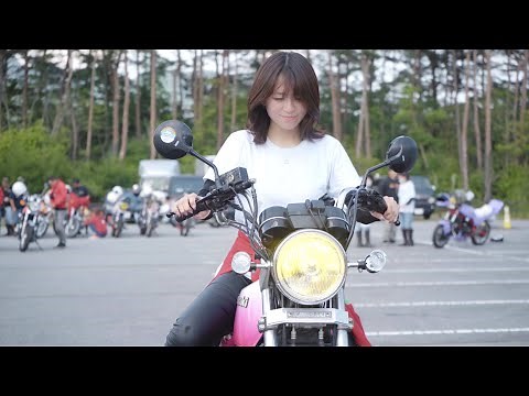 Beautiful women riding on Kawasaki