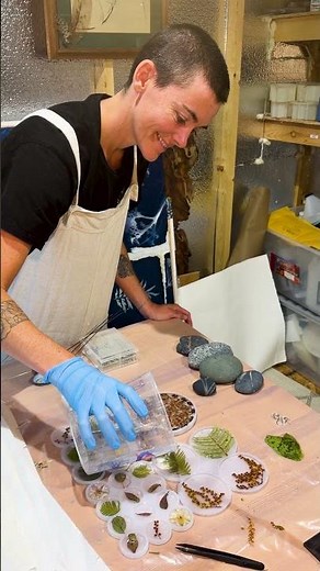 Making floral encapsulations with real flowers inside.
