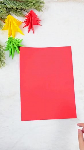 11K views · 12 reactions | Turn a sheet of colored paper into this easy DIY Christmas tree  Make any and every color you like for cute holiday decor that only takes a few minutes to make.  Use them for mantle decor, tiny handmade gifts or make a forest of them for a unique and inexpensive Christmas centerpiece idea #crafts #diy #christmascrafts #holidaydecor #origami | DIY Joy | Facebook