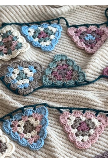 easiest way to add whimsy to any shelf or window! No pattern needed, just some scrap yarn and a dream ✨ lemme know if you want a step by step tutorial! Very beginner friendly. I haven’t quite figured out the best spot for this crochet granny square garland but it’s already inviting spring into my decor that’s for sure!! #crochet #crochetinspo #craft #homedecor #valentinesday