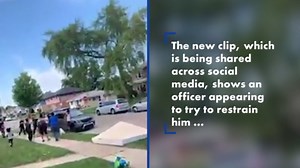 Jacob Blake seen struggling with officers before being shot, new video shows