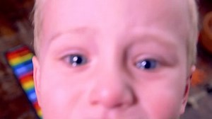 Close Up Of Caucasian Toddler Boy Crying To His Mom After Being Upset