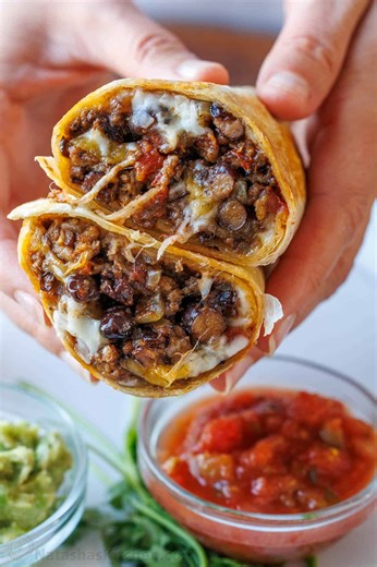 This homemade Beef Burrito recipe is perfect for meal prep and back-to-school lunches 🌯....Recipe: https://natashaskitchen.com/beef-burrito-recipe/ | NatashasKitchen.com