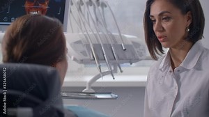 The orthodontist discusses the solution of the patient's problems and the algorithm of dental treatment. Healthy and beautiful smile