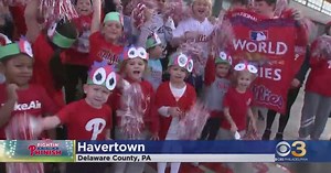 Phillies fans cheer on the team at Sacred Heart School