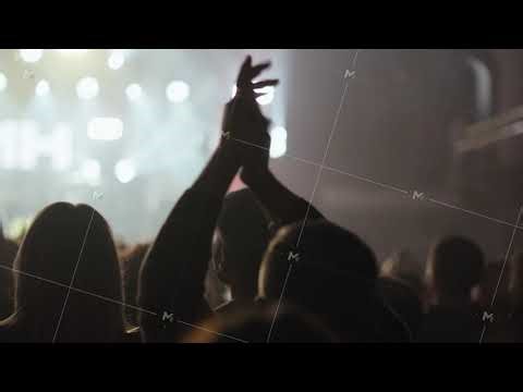 Concert Crowd Cheering and Clapping with Hands Up