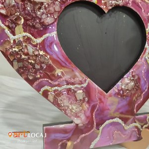 RESIN ART PHOTOFRAME ONLINE TUTORIAL WITH KITS The season of love is just around the corner. Celebrate love in a different way ,create your own beautiful gift for your valentine! In this workshop you will learn to create this gorgeous resin photoframe ! You can use it to display your precious memories with your loved one . The workshop is pre recorded and kits (limited kits only) will be provided for the same ,so you can watch and make the same at your own comfort. The video is going to be for l