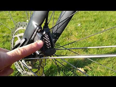 How to remove a stuck bicycle disc brake pad retaining pin