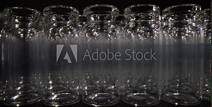 Glass vials for liquid vaccine samples. Laboratory equipment for dispensing liquid samples