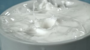 Super slow motion fresh milk. High quality FullHD footage