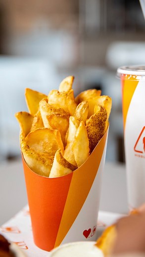 It’s National Fry Day 🍟🧡 Come celebrate with us and try the All-New Naf Fries. Trust us, they are a game changer. | Naf Naf Grill