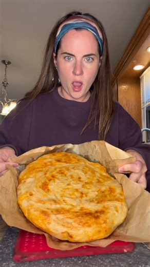 No knead cheese bread A recipe from Brooke Ervin! In a bowl add 1 & 1/2 cup warm water 2 & 1/4 tsp yeast 3 & 1/4 cup flour 1 tsp salt 1 tsp garlic powder - optional 1 tsp Onion powder - optional Mix well till a shaggy dough ball 2 cups grated cheese (any kind works) Mix well Grease bowl cover dough and let rest for 1.5 hour Plop dough on to parchment paper and make any shape you want Place dough in Dutch oven- Can also use bread pans Can add extra cheese on top - optional Bake covered for 20 min