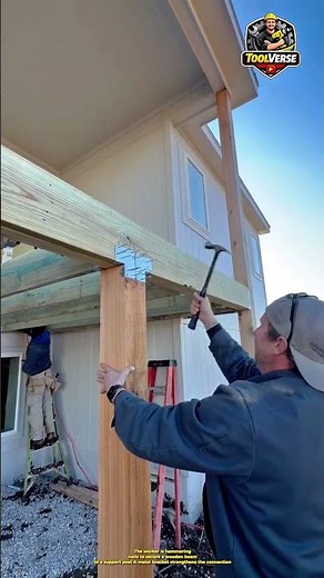 Installing Wooden Beams to Support Posts Using a Hammer in Deck Construction #constructionwork