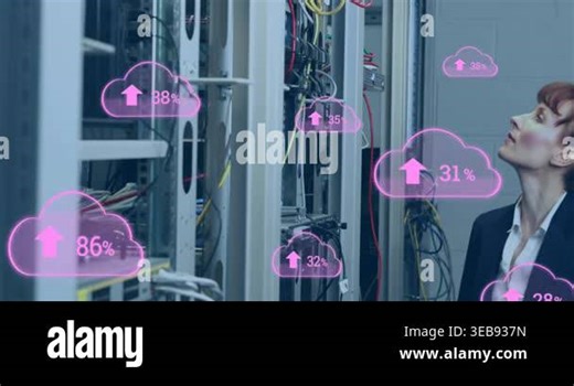 Animation of cloud icons with growing numbers over caucasian woman in server room. global technology, data processing and digital interface concept digitally generated video Stock Video Footage - Alamy