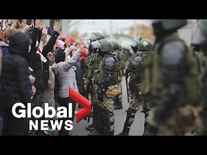 Belarus protests: Police fire warning shots as tens of thousands flood Minsk streets