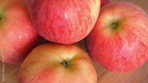 Apples of varieties Gala and Ligol, video close-up. Fruits rotate.