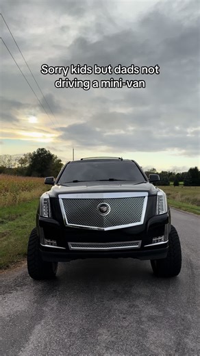 Why Dads Prefer Escalade Over Minivans