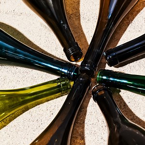 Recycle Glass Bottles To DIY An Awesome Table! | Crafty Panda How