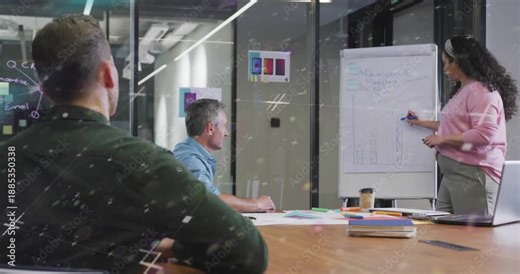 Presenter drawing on flipchart in business meeting, answering raised hand while color bars passing